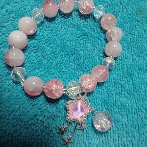 Silvertone white pink beaded star stretch bracelet